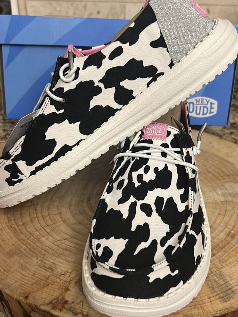 Hey Dude Cow Print Slip-On Shoes with Pink Accent - Picture 2 of 6